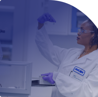 Female scientist holding a vial