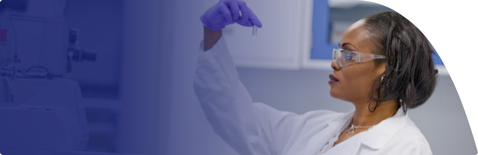 Female scientist holding a vial